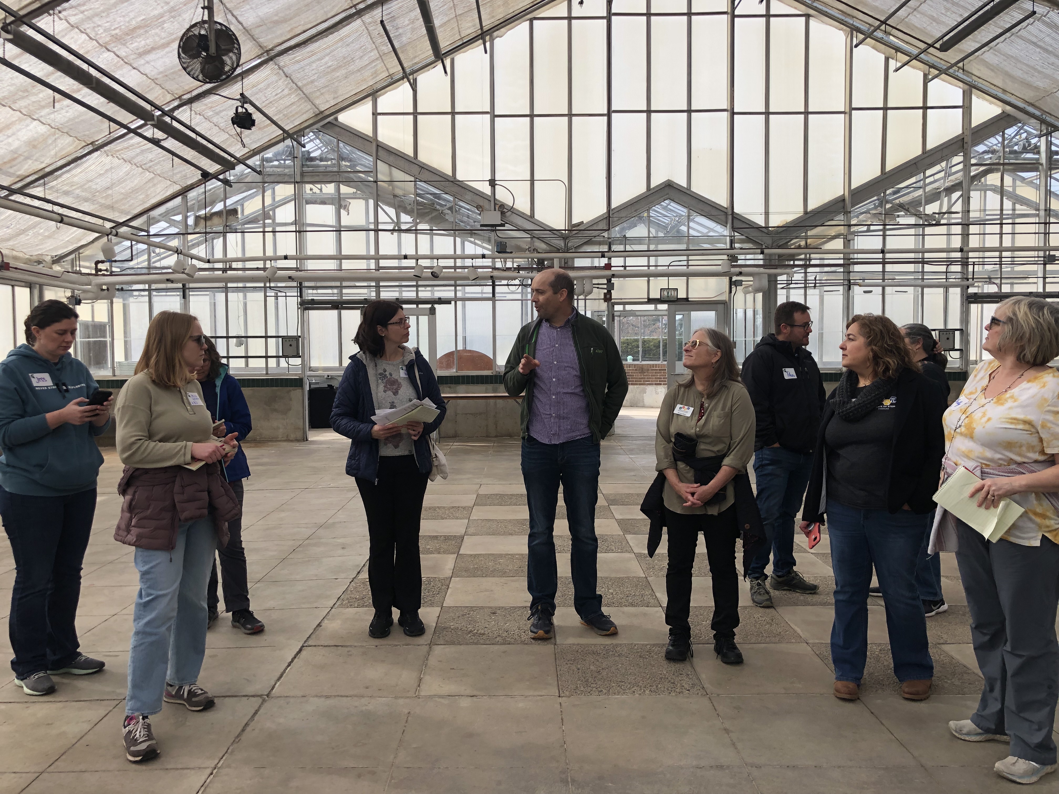 Teacher and staff interacting and participating in the tour of the Lowry Lab